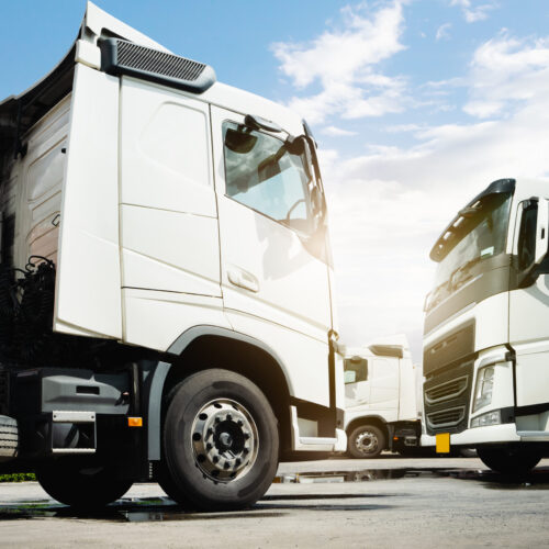 Semi Trucks on The Parking Lot at Warehouse. Tractor Truck. Trucking. Diesel Trucks. Logistics, Cargo Freight Transportation.